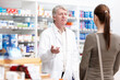 © peopleimages.com - Pharmacist, customer and support for wellness, care or medicine as drugstore, chemist or pharmacy. Medical professional, male person and woman for prescription or info in dispensary as advice or help