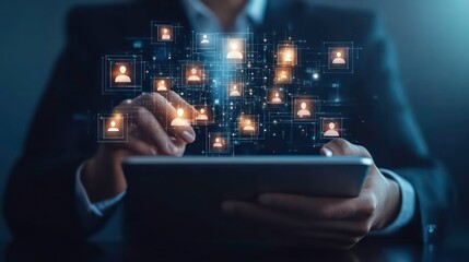Poster - A person's hand uses a tablet to connect with a network of digital profiles.