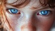 © Johannes - A close up of a person with blue eyes looking at the camera