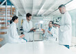 © peopleimages.com - Group, scientist and medical research in chemistry lab for science experiment in pharmaceutical. Teamwork, people and discussion for pathology test, results and analysis for mpox vaccine in hospital
