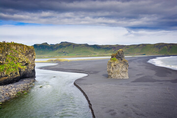 Wall Mural - View from Dyrhólaey towards black sand Reynisfjara beach, Iceland