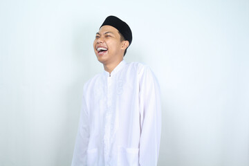 ecstatic asian muslim man laughing happy isolated on white background