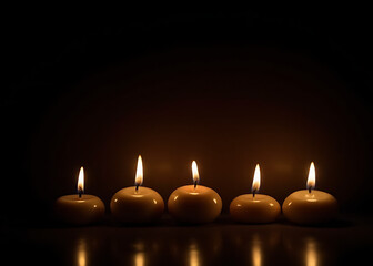 Poster - Dark background with burning candles in front create a dramatic and intimate ambiance visually appealing.