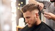 © Route66 - handsome young English man at the barbershop, AI generated