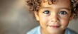 © vxnaghiyev - Close up portrait of a lovely mixed race boy An utterly charming child with an exceptionally sweet and innocent expression on his face. with copy space image. Place for adding text or design