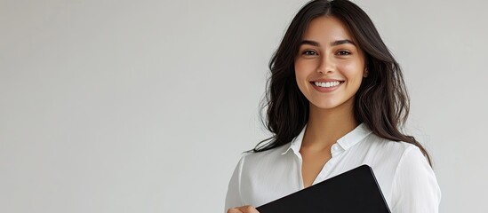 Portrait of a joyful smiling businesswoman holding a black folder set against a white background. with copy space image. Place for adding text or design