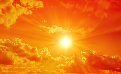 Poster - Bright orange sun shining through clouds in dramatic sunset sky