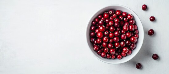 Fototapete - Cranberries in a white bowl viewed from above Cranberry Food Fruit Berry Fruit Food and Drink. with copy space image. Place for adding text or design