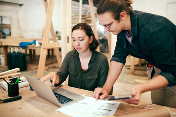 Poster - Carpentry, planning and people on laptop in workshop for timber, lumber and furniture manufacturing. Construction business, woodworking and man and woman on tech for online order, teamwork or meeting