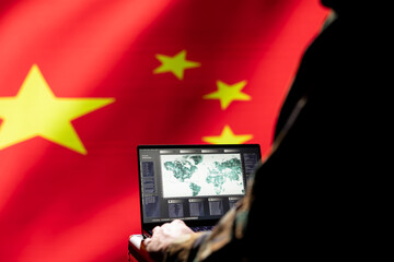 Poster - China red army expert in headquarters conducts tactical surveillance, utilizing software on laptop. Close up shot of equipment used by chinese patriot to look at at world map on screen