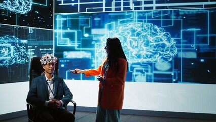 Poster - Neuroscientist doing demonstration at AI convention gathering tech startups and academics, showing how to use EEG headset to link brain with artificial intelligence, camera B