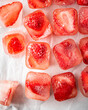 © Scopio - Strawberry Ice Cubes on White Background