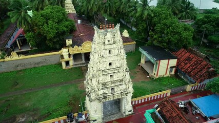 Wall Mural - Hindu temple with mountains in the background