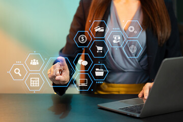 Wall Mural - Social media and Marketing virtual icons screen of business women typing keyboard with laptop computer and smart phone at office.