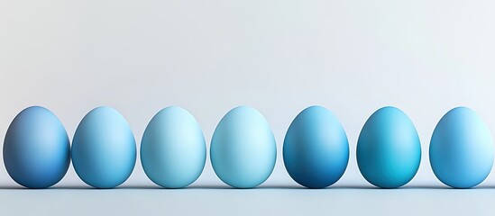 Poster - A row of ombre blue Easter eggs set against a white background. with copy space image. Place for adding text or design