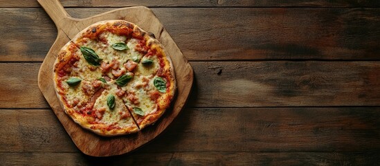 Poster - pizza cutting board on rustic wooden background. with copy space image. Place for adding text or design