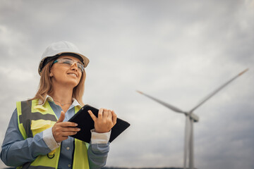 Poster - A skilled female engineer is overseeing a vital renewable energy project at a large wind farm, focusing on sustainability initiatives and promoting environmental best practices in the industry