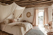 A bedroom with a bed and a canopy over it