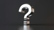 © Morning - A shiny chrome question mark on a gray background.