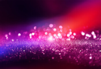 Poster - Pink glitter sparkles against a dark background with out-of-focus lights.