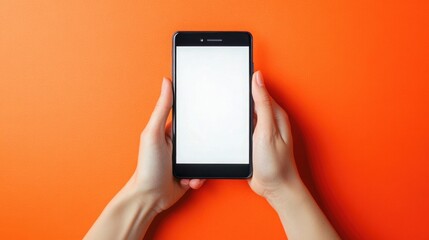 Poster - Hands holding a smartphone with a blank white screen against a vibrant orange background