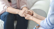 © Prostock-studio - Care, trust, professionalism concept. Close up of therapist holding female patient hands, comforting her client, panorama with copy space