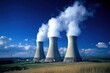 © Алена Ваторина - Nuclear power plant cooling towers emitting steam against a blue sky
