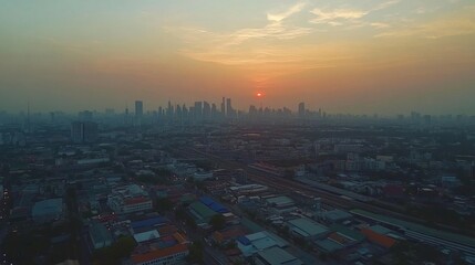 Leinwandbilder - Urban Sunset Over Skyline with Soft Haze