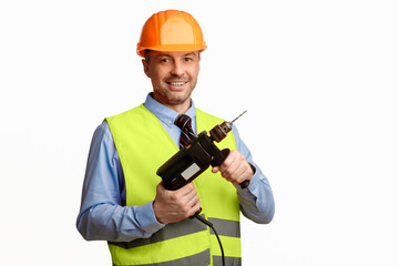 Poster - Repairman Worker Holding Electric Drill Posing Smiling To Camera Over White Studio Background. Building Tools Concept