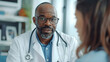 © Juan Camilo - Male doctor with stethoscope talking to patient