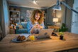 © Miljan Živković - one woman adult caucasian work on her laptop at home happy smile