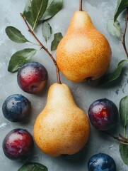 Two pears and plums on a table