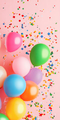 Colorful helium balloons floating against a clear blue sky, symbolizing celebration and joy.