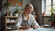 © Endry Creator - Woman in apron drawing at desk with plants, books, bright window in creative studio. Generative, AI,