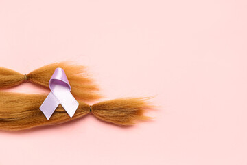 Wall Mural - Red hair strands for donation with purple awareness ribbon on pink background