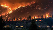 © Rendiero - Flames from the Creek wildfire encircle a mountainside above homes
