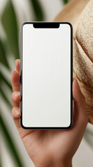 Poster - A person is holding a cell phone with a white screen. The phone is in a hand and the person is wearing a straw hat