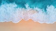 © hassan - Soft ocean wave gently rolling onto a sandy beach, capturing a peaceful seaside background with clear blue water and golden sand
