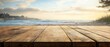© hassan - Long wooden table with a scenic beach landscape in the background, blurred view of coastal horizon on a sunny day