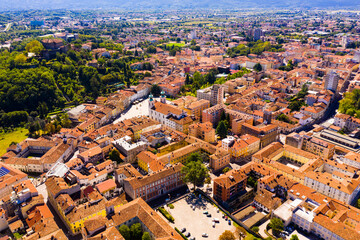 Wall Mural - View from drone of historic centre of Gorizia with ancient castle on hill dominating city, Italy..