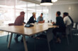 © Seisa/peopleimages.com - Group, people and office in business meeting for feedback with discussion, collaboration and blur. Teamwork, review and talking for communication in project management agency or company in corporate