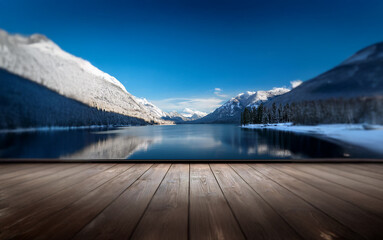 Poster - A serene winter landscape with snow-capped mountains reflecting on a still lake, viewed from a wooden deck.