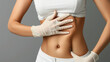 © Kanchanit - Transformative Liposuction Procedure on the Abdomen of a Beautiful Roundish Woman, Demonstrating Effective Body Contouring