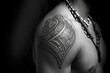 © Nico - A tribal tattoo design covering the upper arm and shoulder, with bold, sweeping lines and patterns.