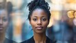 © Zahfran - Striking black woman stands out confidently from blurred crowd