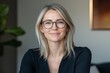 © Aleksandr S - Successful woman CEO confidently seated in her contemporary office, showcasing leadership and executive presence in a well-designed workspace