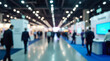 © Dmytriy - The image shows a modern technology exhibition with various booths and participants discussing innovative solutions