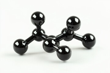 Poster - A close-up shot of a black object placed on a clean white surface