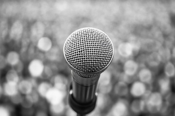Poster - A close-up view of a microphone in monochrome tone