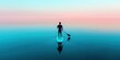 © narak0rn - Silhouette of a person paddling on calm water during sunset, peaceful and serene atmosphere.